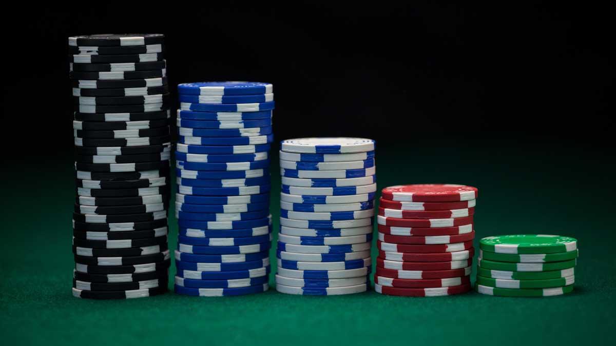 Stacks of Chips on A Green Table
