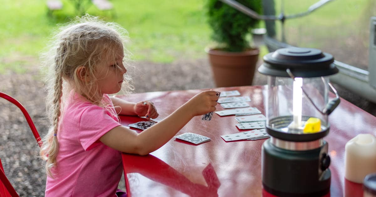 Girl playing cards